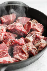 cooking beef chunks in skillet