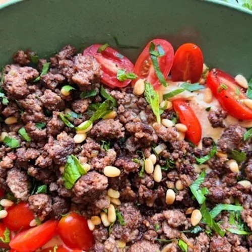 spiced beef over hummus