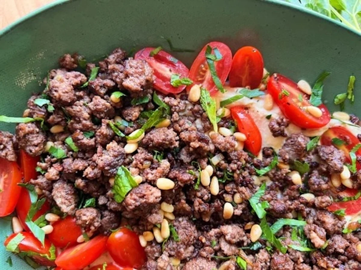 spiced beef over hummus